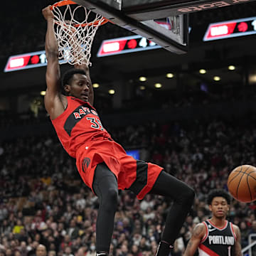 Jan 8, 2023; Toronto, Ontario, CAN; Toronto Raptors forward Christian Koloko (35) dunks against the Portland Trail Blazers during the first half at Scotiabank Arena. Mandatory Credit: John E. Sokolowski-Imagn Images