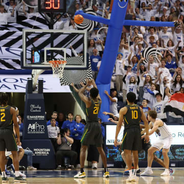 Feb 20, 2024; Provo, Utah, USA; Baylor Bears center Yves Missi (21) shoots a foul shot against the Brigham Young Cougars during the second half at Marriott Center. Mandatory Credit: Rob Gray-USA TODAY Sports