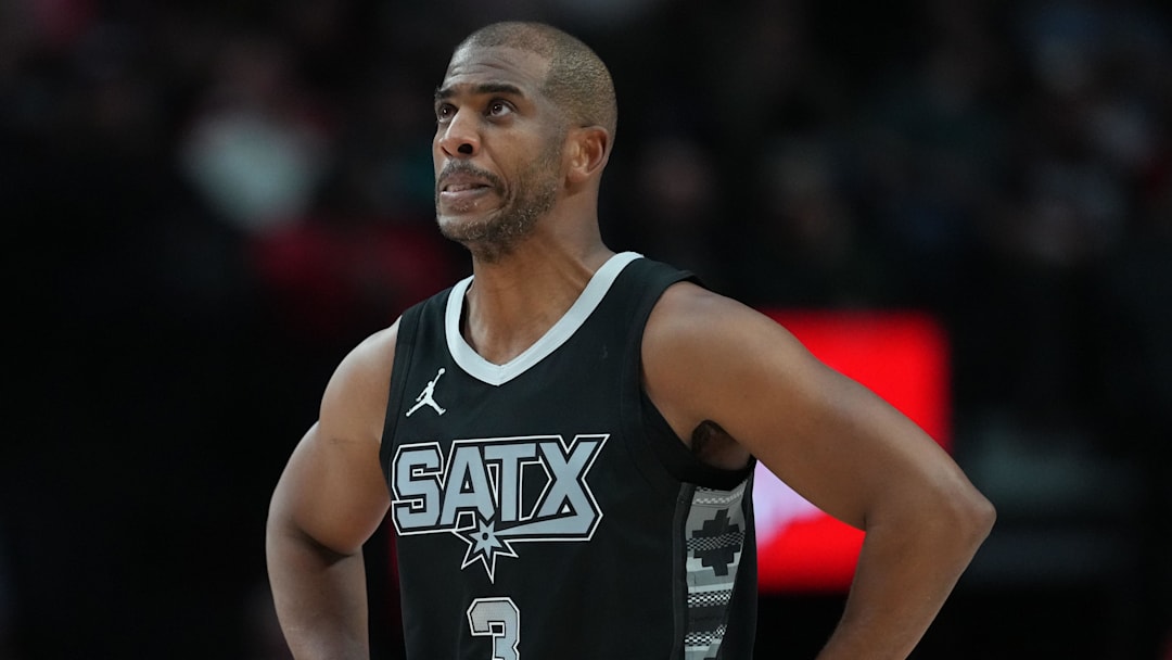 Apr 6, 2025; Portland, Oregon, USA; San Antonio Spurs point guard Chris Paul (3) looks on during the first half against the Portland Trail Blazers at Moda Center. Mandatory Credit: Soobum Im-Imagn Images