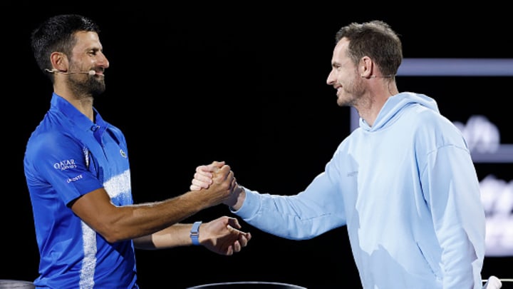 Novak Djokovic and Andy Murray shake hands while warming up for the Australian Open. Novak Djokovic and Andy Murray shake hands while warming up for the Australian Open.