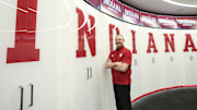 Darian DeVries poses in the Indiana locker room in a promotional shot.