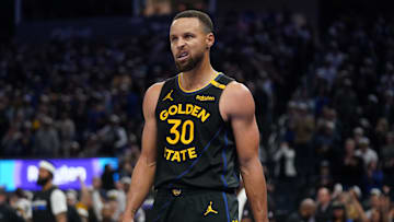 Nov 12, 2024; San Francisco, California, USA; Golden State Warriors guard Stephen Curry (30) reacts after making a layup against the Dallas Mavericks in the fourth quarter at the Chase Center. Mandatory Credit: Cary Edmondson-Imagn Images