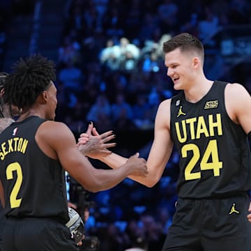 Feb 18, 2023; Salt Lake City, UT, USA; Team Jazz guard Jordan Clarkson (00), guard Collin Sexton (2) and center Walker Kessler (24) celebrate after winning the Skills Competition during the 2023 All Star Saturday Night at Vivint Arena. Mandatory Credit: Kyle Terada-Imagn Images