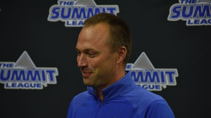 Men's basketball coach Eric Henderson 