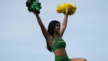 Sep 13, 2025; Evanston, Illinois, USA; A Oregon Ducks cheerleader during the second half of a game against the Northwestern Wildcats at Northwestern Medicine Field at Martin Stadium. Mandatory Credit: David Banks-Imagn Images