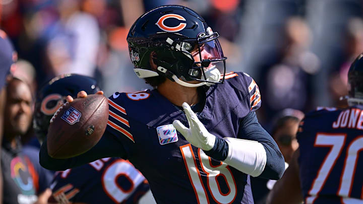 Oct 6, 2024; Chicago, Illinois, USA; Chicago Bears quarterback Caleb Williams (18) warms up before the game against the Carolina Panthers at Soldier Field. Mandatory Credit: Daniel Bartel-Imagn Images Oct 6, 2024; Chicago, Illinois, USA; Chicago Bears quarterback Caleb Williams (18) warms up before the game against the Carolina Panthers at Soldier Field. Mandatory Credit: Daniel Bartel-Imagn Images
