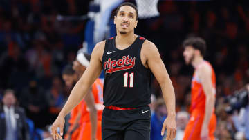 Jan 23, 2024; Oklahoma City, Oklahoma, USA; Portland Trail Blazers guard Malcolm Brogdon (11) looks down the court at the scoreboard during the second half against the Oklahoma City Thunder at Paycom Center. Mandatory Credit: Alonzo Adams-USA TODAY Sports