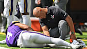 Aug 9, 2025; Minneapolis, Minnesota, USA; Minnesota Vikings wide receiver Rondale Moore (4) is quickly attended to by a Houston Texans trainer after suffering a lower leg injury during the second quarter at U.S. Bank Stadium. Mandatory Credit: Jeffrey Becker-Imagn Images