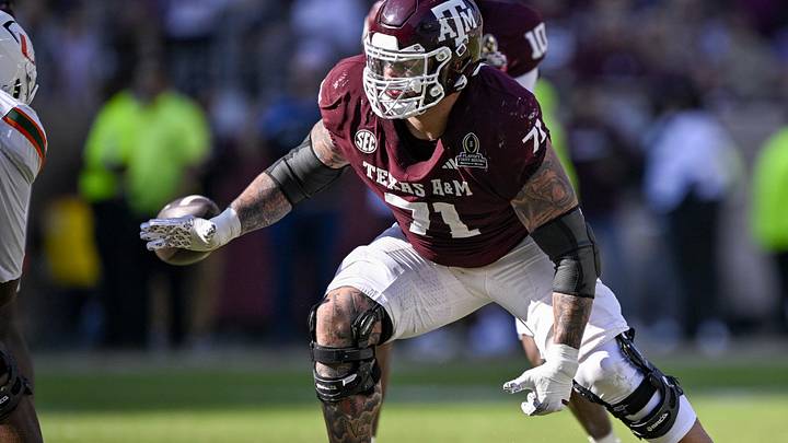 Dec 20, 2025; College Station, TX, USA; Texas A&M Aggies offensive lineman Chase Bisontis (71) blocks the rush during the game between the Aggies and the Hurricanes at Kyle Field. Mandatory Credit: Jerome Miron-Imagn Images