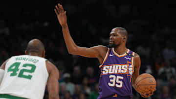 Mar 26, 2025; Phoenix, Arizona, USA; Phoenix Suns forward Kevin Durant (35) calls out a play against the Boston Celtics during the first half at Footprint Center. Mandatory Credit: Rick Scuteri-Imagn Images