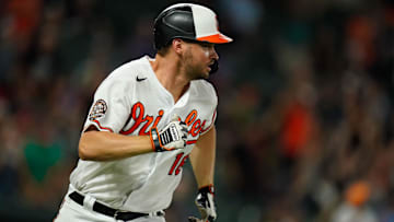 Jul 27, 2022; Baltimore, Maryland, USA;  Baltimore Orioles designated hitter Trey Mancini (16) runs out a ninth inning single against the Tampa Bay Rays at Oriole Park at Camden Yards. Mandatory Credit: Tommy Gilligan-Imagn Images