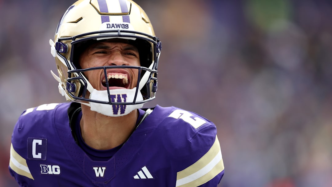 Quarterback Demond Williams Jr. yells in celebration during Washington's 42-25 win over No. 23 Illinois on Oct. 25, 2025.