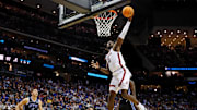 Mar 27, 2025; Newark, NJ, USA; Alabama Crimson Tide center Clifford Omoruyi (11) dunks the ball against Brigham Young Cougars forward Mawot Mag (0) during the second half during an East Regional semifinal of the 2025 NCAA tournament at Prudential Center. Mandatory Credit: Vincent Carchietta-Imagn Images