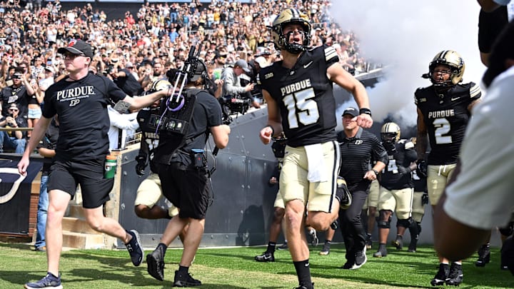 Purdue Boilermakers quarterback Ryan Browne (15) runs out of the tunnel Purdue Boilermakers quarterback Ryan Browne (15) runs out of the tunnel