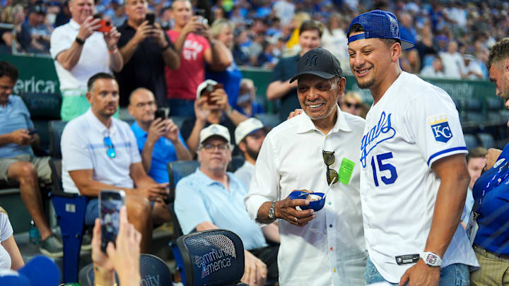 Kansas City Chiefs QB Patrick Mahomes poses for a picture with Hall of Famer Reggie Jackson at the Kansas City Royals game.
