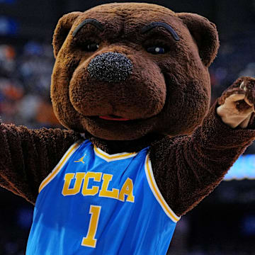 Mar 22, 2025; Lexington, KY, USA; The UCLA Bruins mascot cheers during the first half of the game between the Tennessee Volunteers and the UCLA Bruins in the second round of the NCAA Tournament at Rupp Arena. Mandatory Credit: Aaron Doster-Imagn Images