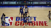 May 14, 2024; Chicago, IL, USA; Adam Bona (90) and Urich Chomche (62) go for a jump ball during the