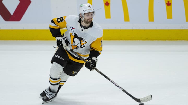 Mar 26, 2026; Ottawa, Ontario, CAN; Pittsburgh Penguins center Thomas Novak (18) skates with the puck in overtime against the Ottawa Senators at the Canadian Tire Centre. Mandatory Credit: Marc DesRosiers-IMAGN Images
