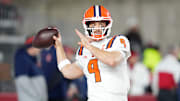 Nov 22, 2025; Madison, Wisconsin, USA; Illinois Fighting Illini quarterback Luke Altmyer (9) warms up before a game against the Wisconsin Badgers at Camp Randall Stadium. Mandatory Credit: Kayla Wolf-Imagn Images
