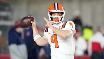 Nov 22, 2025; Madison, Wisconsin, USA; Illinois Fighting Illini quarterback Luke Altmyer (9) warms up before a game against the Wisconsin Badgers at Camp Randall Stadium. Mandatory Credit: Kayla Wolf-Imagn Images
