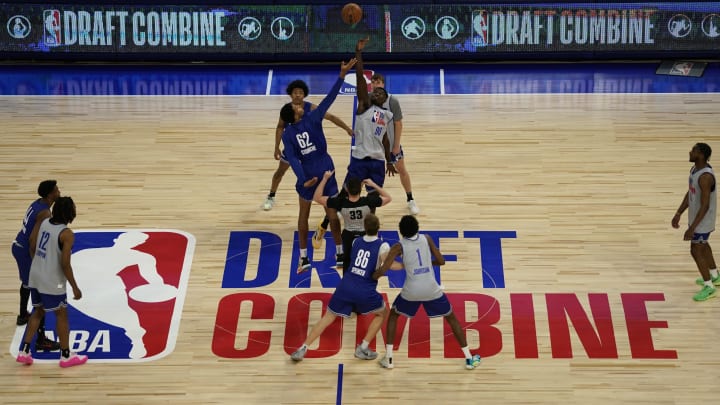 May 14, 2024; Chicago, IL, USA; Adam Bona (90) and Urich Chomche (62) go for a jump ball during the 2024 NBA Draft Combine  at Wintrust Arena. Mandatory Credit: David Banks-USA TODAY Sports