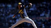 Mar 27, 2025; Bronx, New York, USA; Milwaukee Brewers starting pitcher Freddy Peralta (51) pitches against the New York Yankees during the second inning at Yankee Stadium. Mandatory Credit: Brad Penner-Imagn Images