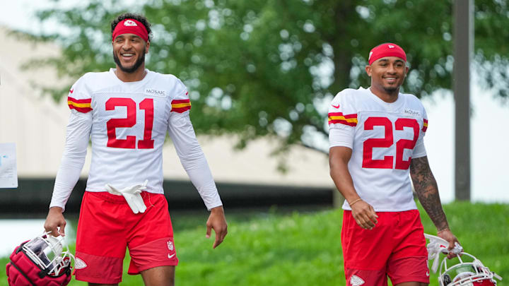 Jul 22, 2025; St. Joseph, MO, USA; Kansas City Chiefs safety Jaden Hicks (21) and cornerback Trent McDuffie (22) walk down the hill to the practice fields during training camp at Missouri Western State University. Mandatory Credit: Denny Medley-Imagn Images