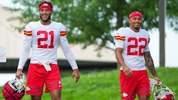 Jul 22, 2025; St. Joseph, MO, USA; Kansas City Chiefs safety Jaden Hicks (21) and cornerback Trent McDuffie (22) walk down the hill to the practice fields during training camp at Missouri Western State University. Mandatory Credit: Denny Medley-Imagn Images