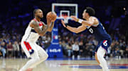 Dec 2, 2025; Philadelphia, Pennsylvania, USA; Washington Wizards forward Cam Whitmore (1) shoots the ball against Philadelphia 76ers guard Jared McCain (20) in the second quarter at Xfinity Mobile Arena. Mandatory Credit: Kyle Ross-Imagn Images