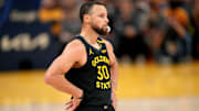 Golden State Warriors' Stephen Curry stands on the court during a break against the Houston Rockets in the 2025 NBA Playoffs.