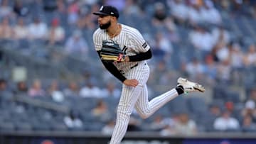 Jun 19, 2025; Bronx, New York, USA; New York Yankees relief pitcher Devin Williams (38) follows through on a pitch against the Los Angeles Angels during the ninth inning at Yankee Stadium. Mandatory Credit: Brad Penner-Imagn Images