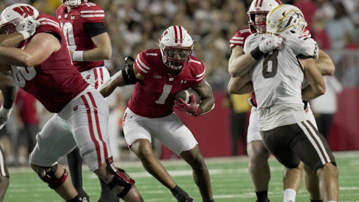 Wisconsin running back Chez Mellusi (1) finds a hole in the Western Michigan defense during the second quarter of their game Friday, August 30, 2024 at Camp Randall Stadium in Madison, Wisconsin.