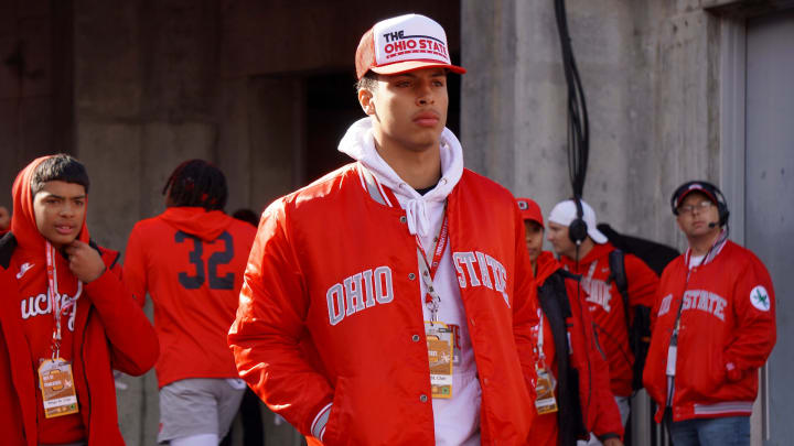 Recruit Tavien St. Clair watches Ohio State warm up before playing Penn State Oct. 21, 2023 at Ohio Stadium.