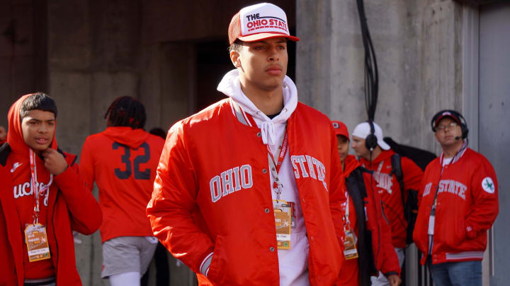 Recruit Tavien St. Clair watches Ohio State warm up before playing Penn State Oct. 21, 2023 at Ohio Stadium.