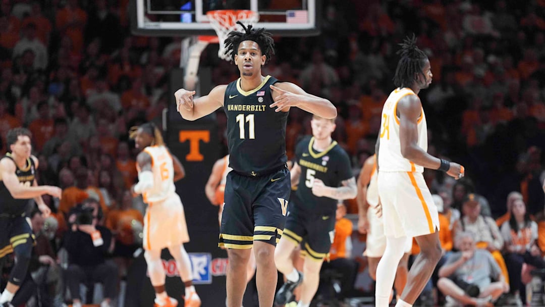 Vanderbilt's AJ Hoggard (11) celebrates on the court during a men’s college basketball game between Tennessee and Vanderbilt at Thompson-Boling Arena at Food City Center, Saturday, Feb. 15, 2025.