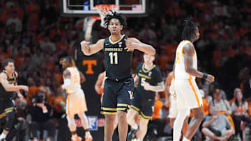 Vanderbilt's AJ Hoggard (11) celebrates on the court during a men’s college basketball game between Tennessee and Vanderbilt at Thompson-Boling Arena at Food City Center, Saturday, Feb. 15, 2025.