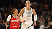 Aug 23, 2025; Washington, District of Columbia; Las Vegas Aces center A'ja Wilson (22) is all smiles after a basket against the Washington Mystics during the fourth quarter at CareFirst Arena. 