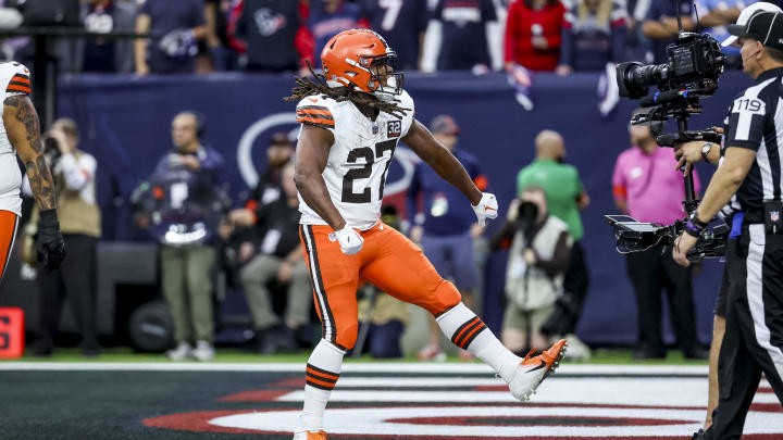 Jan 13, 2024; Houston, Texas, USA; Cleveland Browns running back Kareem Hunt (27) celebrates touch down during the first quarter in a 2024 AFC wild card game at NRG Stadium. Mandatory Credit: Troy Taormina-USA TODAY Sports