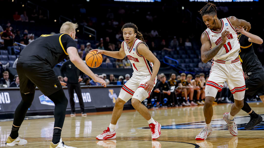 Mar 19, 2026; Oklahoma City, OK, USA; Houston Cougars guard Kingston Flemings (4) dribbles the ball during a first round game of the men's 2026 NCAA Tournament at Paycom Center. 