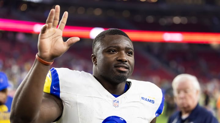 Dec 7, 2025; Glendale, Arizona, USA; Los Angeles Rams linebacker Byron Young (0) against the Arizona Cardinals at State Farm Stadium. Mandatory Credit: Mark J. Rebilas-Imagn Images