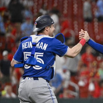 Jun 9, 2025; St. Louis, Missouri, USA;  Toronto Blue Jays relief pitcher Jeff Hoffman (23) celebrates with catcher Tyler Heineman (55) after the Blue Jays defeated the St. Louis Cardinals in ten innings at Busch Stadium. Mandatory Credit: Jeff Curry-Imagn Images