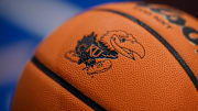 Dec 22, 2023; Lawrence, Kansas, USA; A detail view of the logo on basketballs prior to a game between the Kansas Jayhawks and Yale Bulldogs at Allen Fieldhouse. Mandatory Credit: Denny Medley-Imagn Images