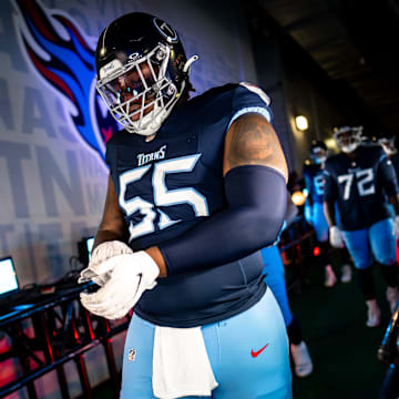 Tennessee Titans offensive tackle JC Latham (55) heads ot the field before a game against the New England Patriots at Nissan Stadium in Nashville, Tenn., Sunday, Nov. 3, 2024.
