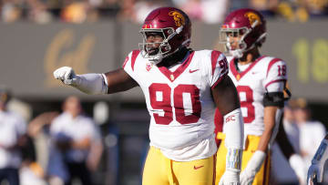 Oct 28, 2023; Berkeley, California, USA; USC Trojans defensive lineman Bear Alexander (90) gestures during the third quarter against the California Golden Bears at California Memorial Stadium. Mandatory Credit: Darren Yamashita-USA TODAY Sports