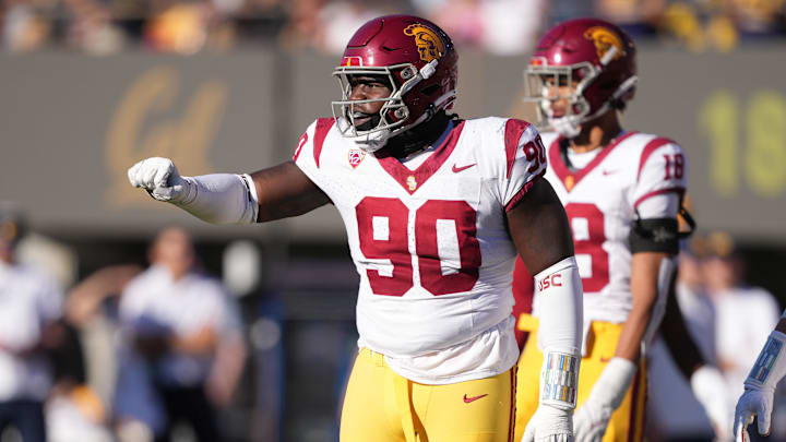 Oct 28, 2023; Berkeley, California, USA; USC Trojans defensive lineman Bear Alexander (90) gestures during the third quarter against the California Golden Bears at California Memorial Stadium. Mandatory Credit: Darren Yamashita-Imagn Images