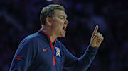 Feb 11, 2025; Manhattan, Kansas, USA; Arizona Wildcats head coach Tommy Lloyd yells at his team during the first half against the Kansas State Wildcats at Bramlage Coliseum. 