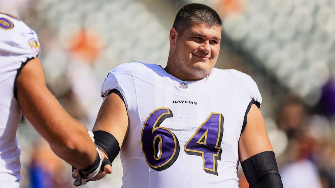 Oct 6, 2024; Cincinnati, Ohio, USA; Baltimore Ravens center Tyler Linderbaum (64) during warmups before the game against the Cincinnati Bengals at Paycor Stadium. Mandatory Credit: Katie Stratman-Imagn Images