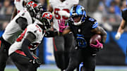 Lions running back Jahmyr Gibbs rushed for 136 yards and two touchdowns in Detroit's win over Tampa Bay.