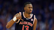 Mar 1, 2025; Lexington, Kentucky, USA; Auburn Tigers guard Miles Kelly (13) celebrates after making a three point basket during the second half against the Kentucky Wildcats at Rupp Arena at Central Bank Center. Mandatory Credit: Jordan Prather-Imagn Images