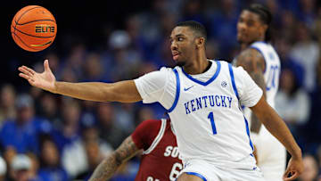 Feb 8, 2025; Lexington, Kentucky, USA; Kentucky Wildcats guard Lamont Butler (1) reaches for the ball during the first half against the South Carolina Gamecocks at Rupp Arena at Central Bank Center. Mandatory Credit: Jordan Prather-Imagn Images